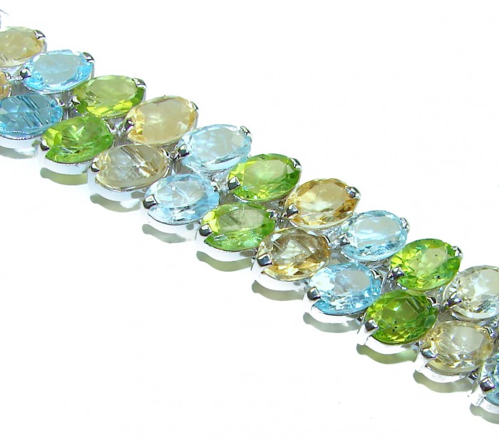 Spectacular 68.5 carat authentic Multigem .925 Sterling Silver handmade bangle Bracelet - Close-up of multigem stones on sterling silver bracelet.