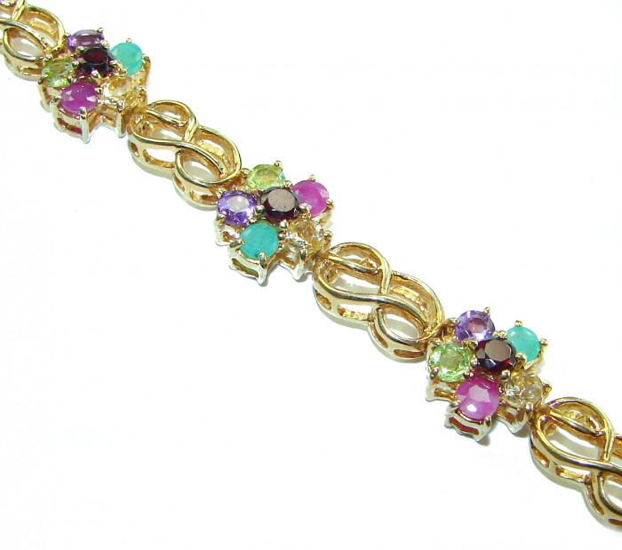 One of the kind 28.5 carat genuine Multigem 18k Gold over .925 Sterling Silver Bracelet - Close-up of multigem bracelet with 18k gold detail.