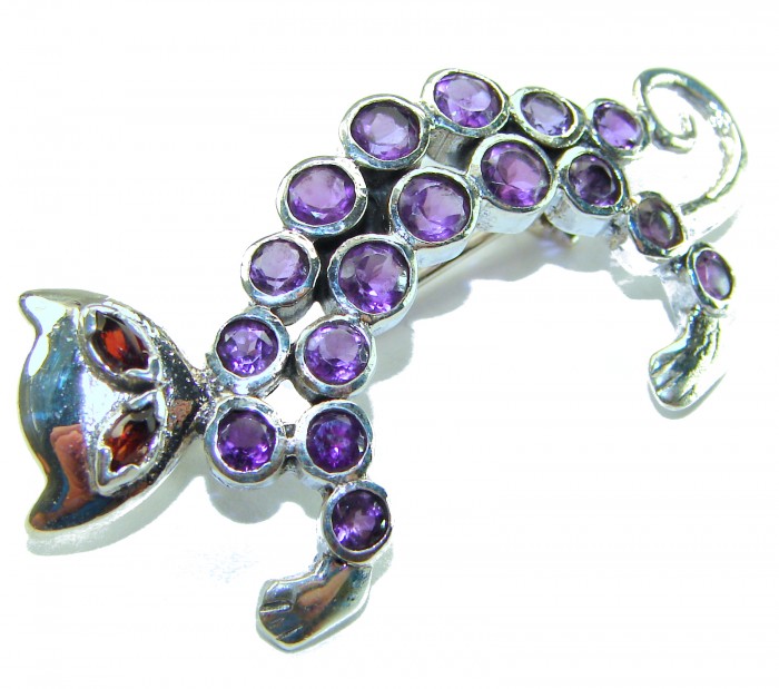 Purple Cat - 16.8 carat Natural Amethyst .925 Sterling Silver handmade Pendant Brooch - Brooch shaped like a cat with purple amethyst stones, side view.