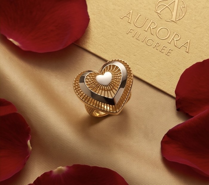 Dubai Style - Golden Heart .925 Sterling Silver dipped in 22K Gold handmade Large ring size 7 1/4 - Golden heart ring on fabric backdrop with rose petals, top view.