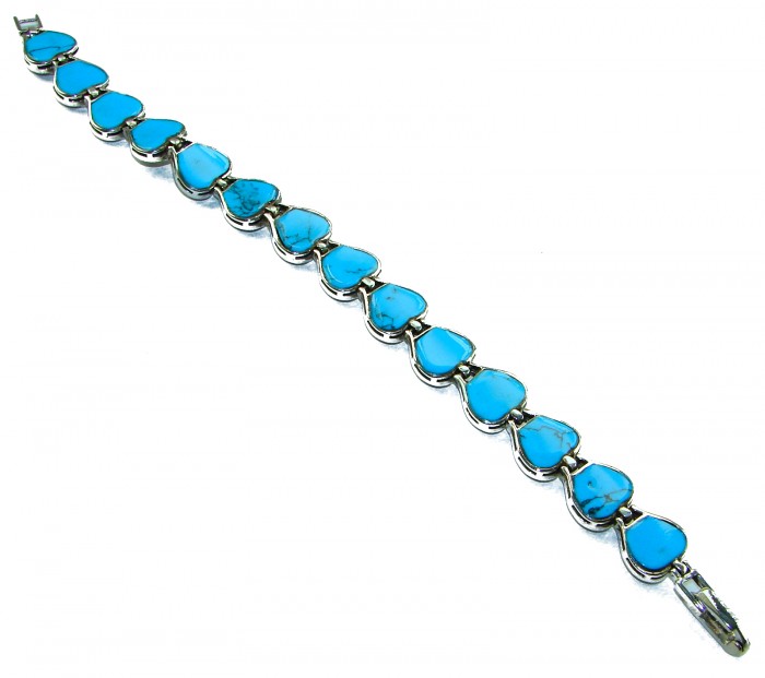 Fantastic inlay Turquoise Marcasite .925 Silver handmade double-sided Bracelet - Turquoise bracelet with heart-shaped stones, side view.