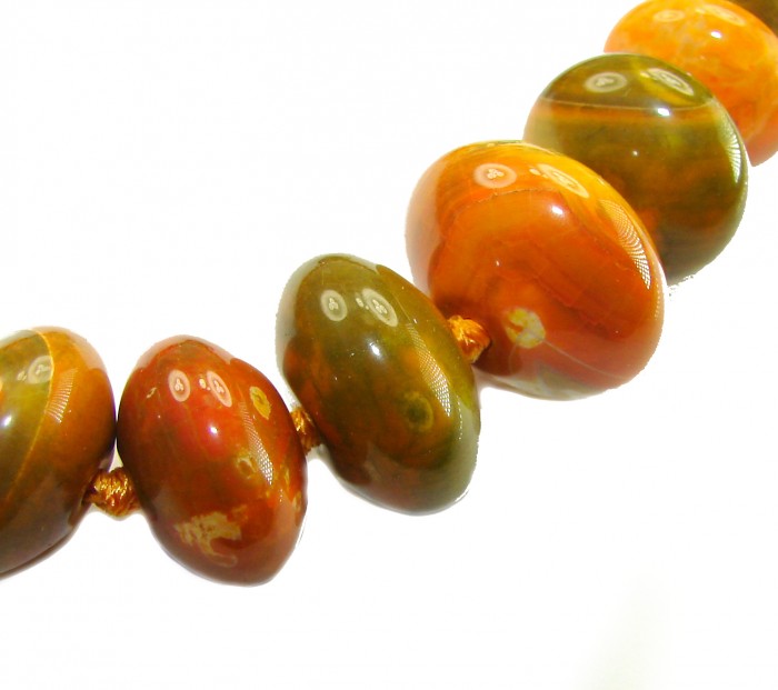 Top quality Rare Unusual Natural Mookiate .925 Sterling Silver Necklace - Close-up of rare natural Carnelian Agate beads on a necklace.