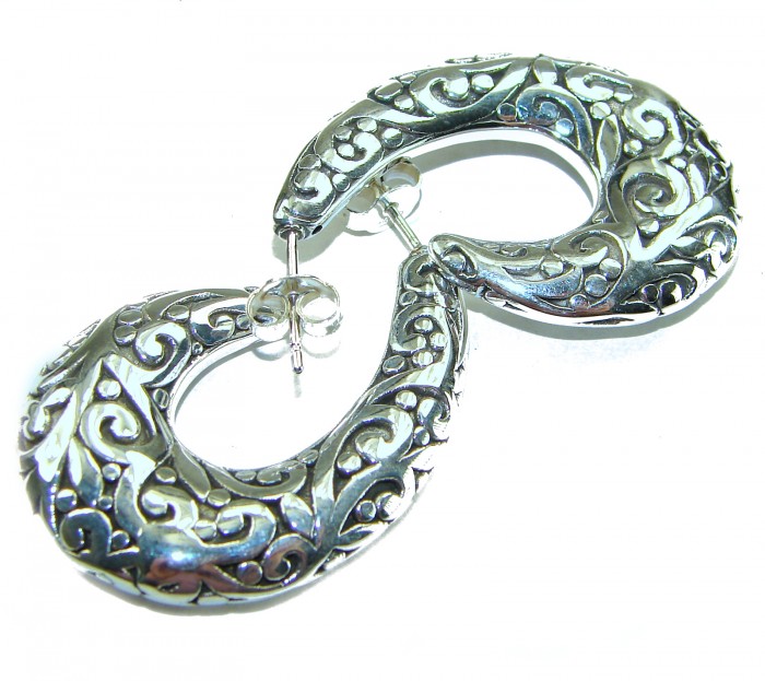 1 5/8 inches long - Free Spirit bohemian Style .925 Sterling Silver handmade Bali made Oversized Earrings - Intricate silver earrings, overhead view, showing filigree detail.