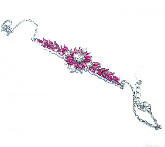 Tiffany - Luxurious natural 26.5 carat Ruby .925 Sterling Silver Statement Bracelet - Bracelet top view with pink rubies and central clear stone.
