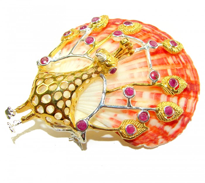 Greaceful Peacock Genuine Ocean Shell Ruby 14K Gold over .925 Sterling Silver handcrafted Pendant brooch - Peacock jewelry on shell with ruby accents, top angle view.