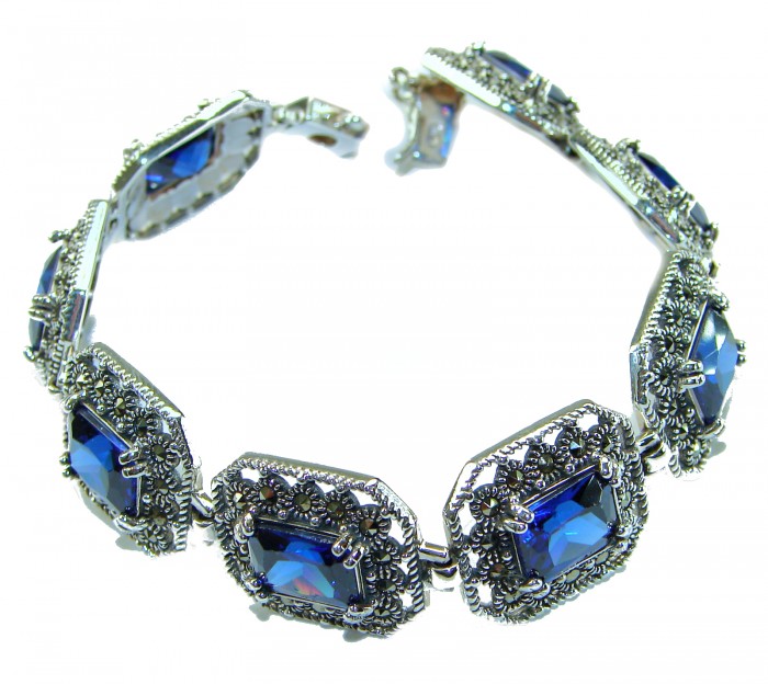 Real Gift of Nature 28.5 carat African Kyanite .928 Sterling Silver handcrafted Bracelet - Bracelet with blue stones and intricate silver settings, angled side view