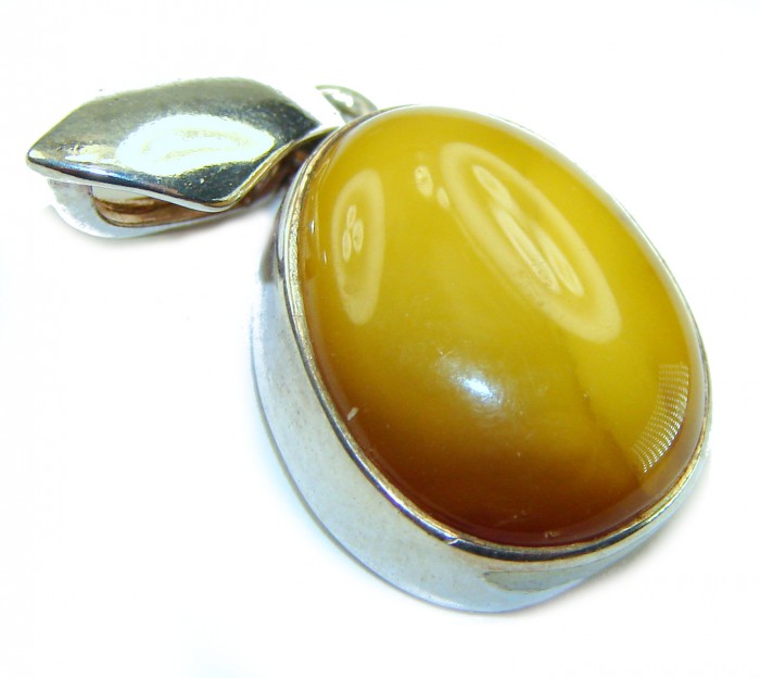 Prehistoric Authentic Baltic Amber .925 Sterling Silver beautifully handcrafted Pendant - Close-up of Baltic amber pendant in sterling silver setting
