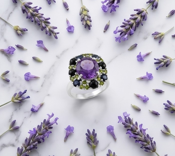 Francesca Genuine 7.7 carat Brazilian Amethyst rhodium over .925 Sterling Silver handcrafted Statement Ring size 8 1/4 - Ring with amethyst and gemstones on marble, surrounded by lavender.