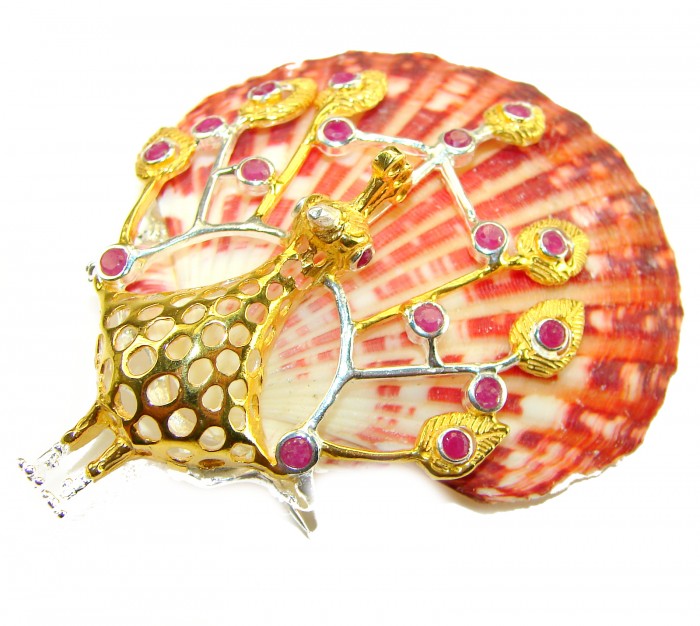 Greaceful Peacock Genuine Ocean Shell Ruby 14K Gold over .925 Sterling Silver handcrafted Pendant brooch - Peacock brooch on shell, rubies and gold, top angle view.