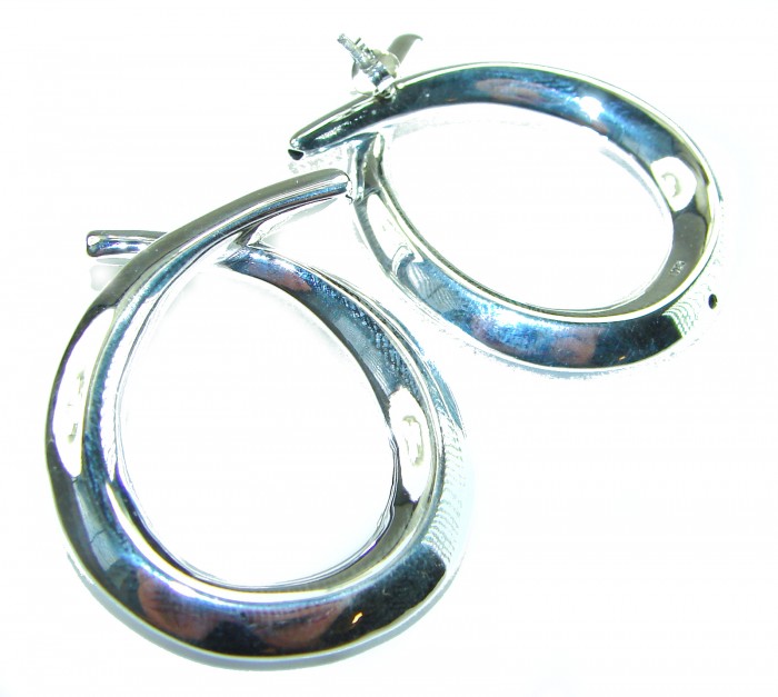 Large 1 5/8 inches long highly polished .925 Sterling Silver Italy made Earrings - Close-up of large polished .925 sterling silver earrings, side view.