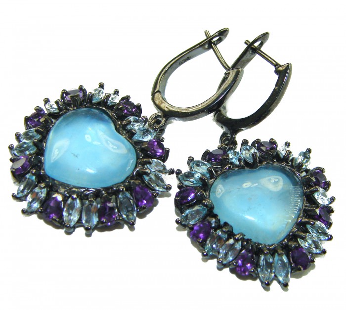 A Heritage in Bloom 12.5 carat Aquamarine black rhodium over .925 Sterling Silver handmade Large Statement Earrings - Close-up of heart-shaped aquamarine earrings with purple accents