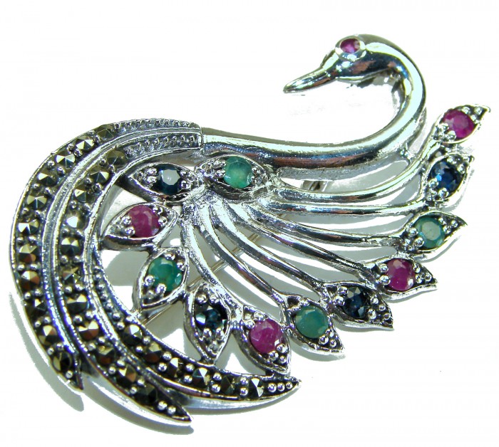 Perfect Swan .925 Sterling Silver handmade Pendant Brooch - Close-up of a swan-shaped sterling silver pendant brooch with gemstones.
