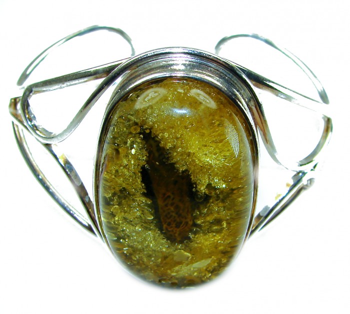 Golden Odyssey Huge Genuine Baltic Amber .925 Sterling Silver handcrafted Bracelet / Cuff - Stone close-up of Golden Odyssey Baltic Amber bracelet with sterling silver.