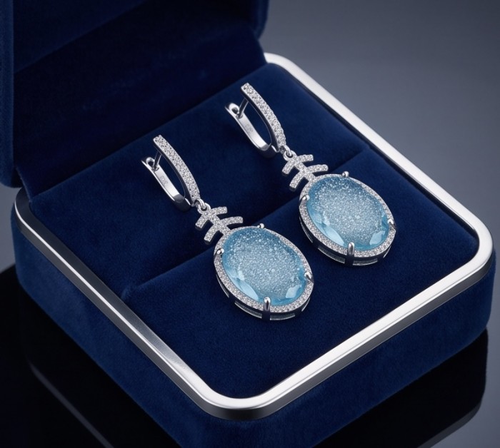 Angelina 20.9 carat authentic Aquamarine .925 Sterling Silver Handcrafted Earrings - Aquamarine earrings in box, top view, with silver detailing