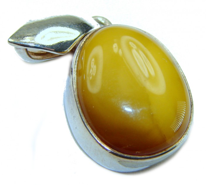 Prehistoric Authentic Baltic Amber .925 Sterling Silver beautifully handcrafted Pendant - Close-up of Baltic amber pendant with silver leaf design