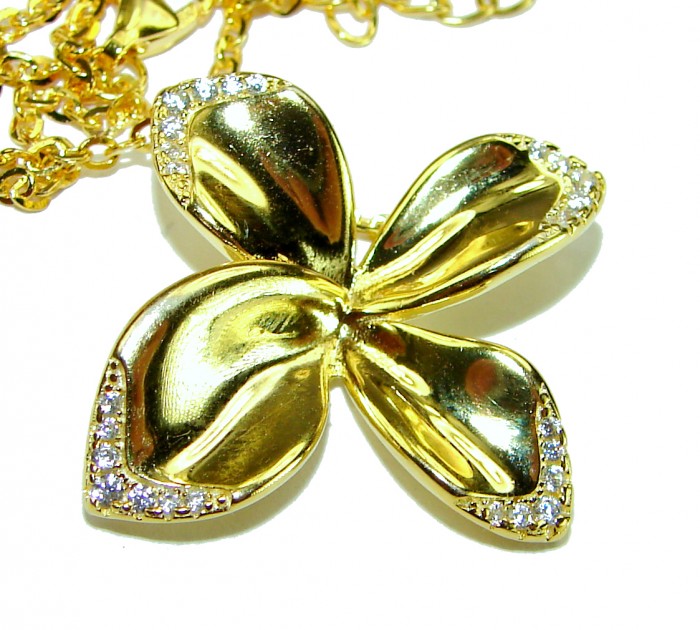 Lotus flower White Topaz highly polished 18K Gold over .925 Sterling Silver Italy made necklace - Gold lotus flower pendant with white topaz, side view close-up.