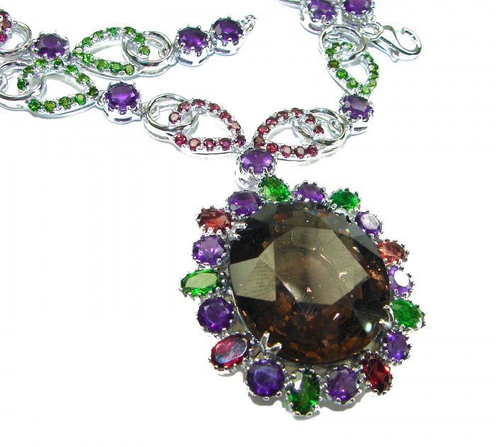 Outstanding 47.5 carat authentic Smoky Topaz .925 Sterling Silver handcrafted Statement necklace - Close-up of a colorful gemstone necklace with smoky topaz centerpiece.