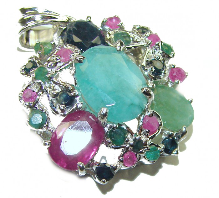 Spectacular 12.8 carat authentic Colombian Emerald .925 Sterling Silver handcrafted Pendant - Stone close-up of emerald and gemstone pendant with silver setting