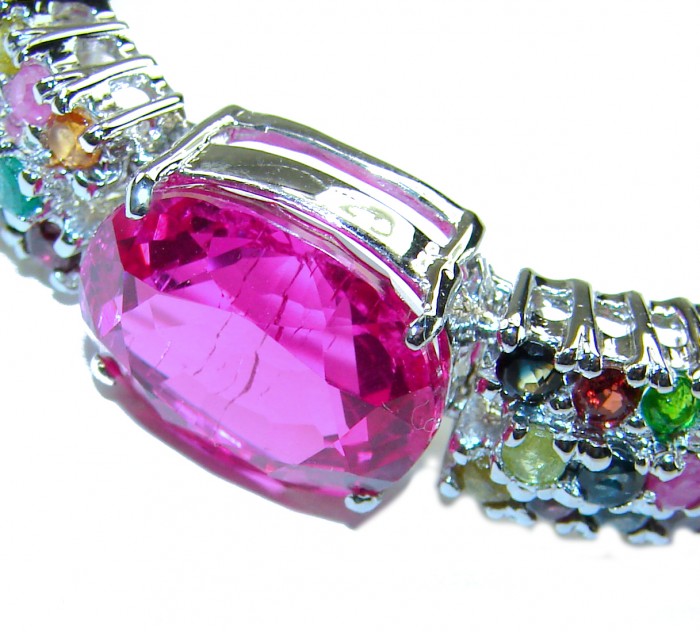 Tiffany - Unapologetically stunning Fuchsia Pink 125.5 carat Pink Sapphire RHODIUM OVER .925 Sterling Silver handcrafted Heavy Bracelet - Close-up of fuchsia pink stone in Tiffany bracelet with colorful gems.