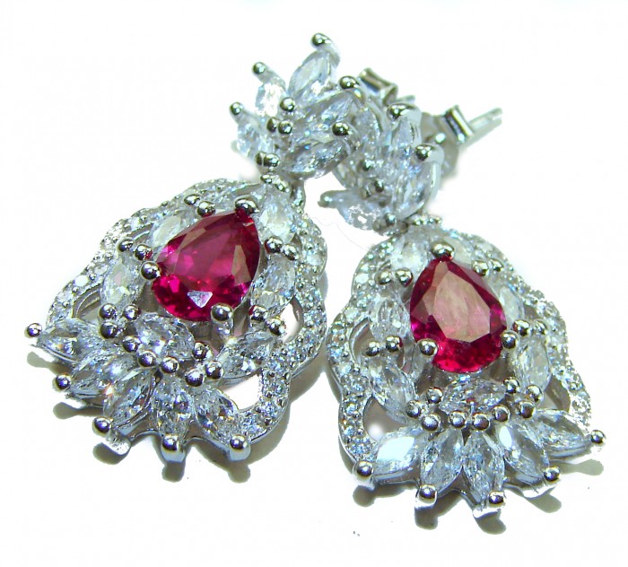 Magnificent Jewel 8.5 carat Ruby .925 Sterling Silver handcrafted incredible earrings - Close-up of ruby and zirconia .925 sterling silver earrings.