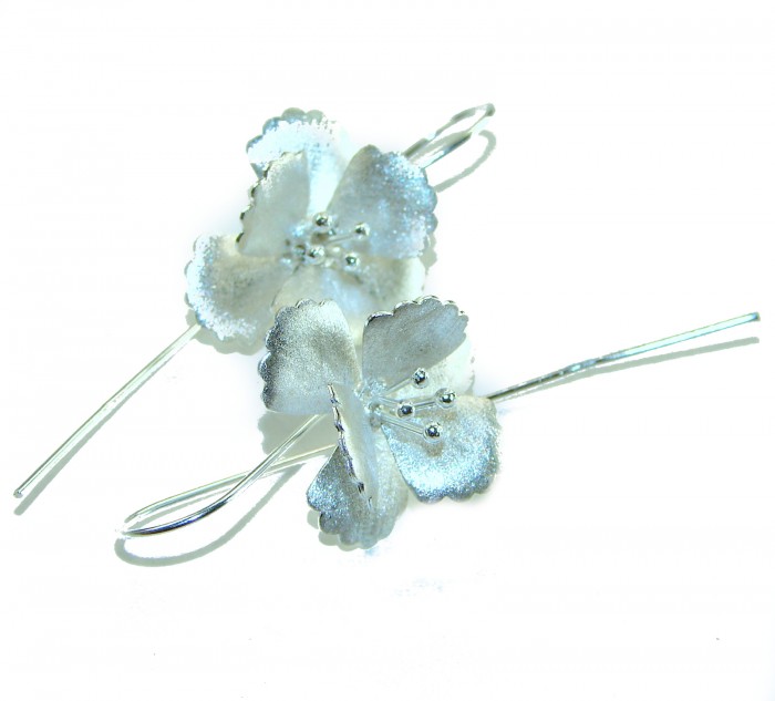 Silver Flowers Italy made .925 Sterling Silver Earrings - Top view of silver flower earrings made with .925 sterling silver.