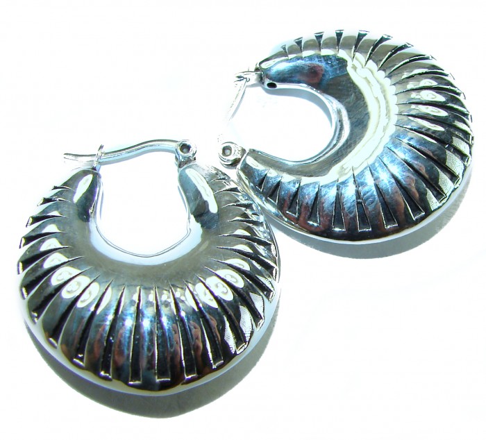 Highly Polished Fancy Modern design .925 Sterling Silver Italy made Earrings - Close-up of highly polished .925 sterling silver earrings.