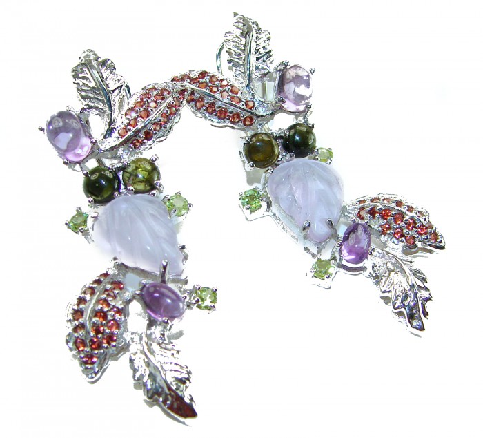 Lavender Beauty authentic 10.2 carat Tanzanite .925 Sterling Silver handcrafted earrings - Tanzanite earrings with gemstones, leaf design, top view.
