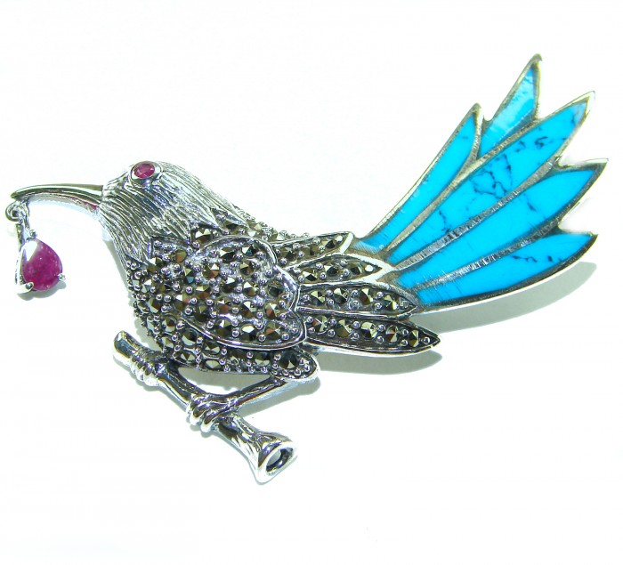 Blue Bird genuine INLAY Turquoise Marcasite .925 Sterling Silver handmade Brooch - Side view of blue bird brooch with turquoise inlay and marcasite accents.