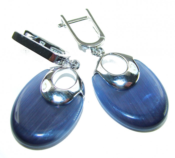 Best quality 12.5 carat African Cats Eye .925 Sterling Silver handcrafted earrings - Close-up of blue cat's eye earrings in sterling silver.