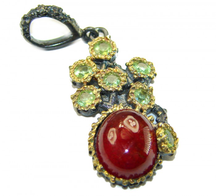 Genuine 4.5 carat Ruby BLACK RHODIUM OVER .925 Sterling Silver handmade Pendant - Close-up of ruby pendant with green stones on black rhodium silver.
