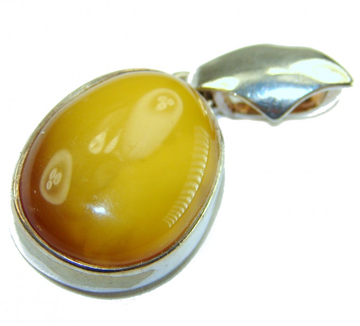 Prehistoric Authentic Baltic Amber .925 Sterling Silver beautifully handcrafted Pendant - Close-up of Baltic amber pendant in sterling silver setting.