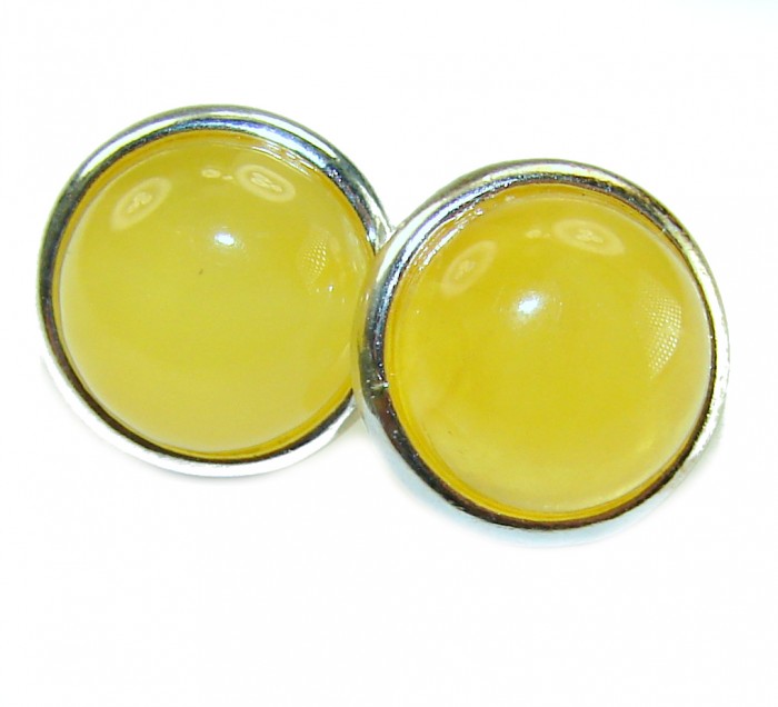 Natural Amber .925 Sterling Silver handmade earrings - Close-up of natural amber earrings in sterling silver settings.
