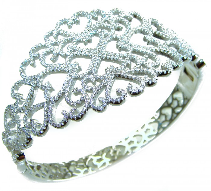 A Million Stars 28.8 carat White Sapphire .925 Sterling Silver Statement Bracelet / Cuff - Ornate bracelet with white sapphires, top view, intricate pattern.