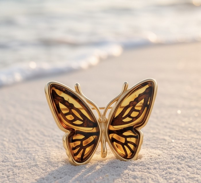 Golden Butterfly natural carved Baltic Amber .925 Sterling Silver dipped in 22K Real Gold handmade Pendant - Golden butterfly amber brooch on sand, ocean in background