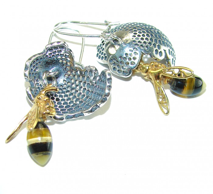 Very Special product - Wonderful Bees Baltic Amber 18K Gold over .925 Sterling Silver entirely handcrafted earrings - Earrings with bee and honeycomb design, side view.