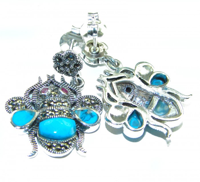 Blue Bees inlay Turquoise Ruby Marcasite .925 Sterling Silver Handcrafted earrings - Close-up of Blue Bees earrings with turquoise, ruby, and marcasite stones.