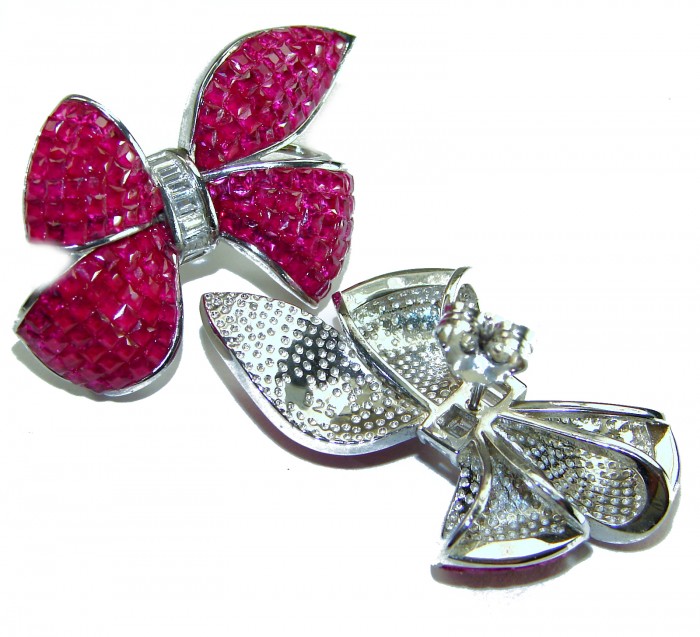 Magnificent Jewel - Bow - mystery setting 25.5 carat Ruby .925 Sterling Silver handcrafted incredible earrings - Bow-shaped jewelry with mystery setting and pink stones, front and back view.
