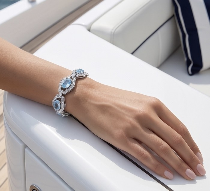 Oceansite - Magnificent 42.5 carat Swiss Blue Topaz .925 Sterling Silver handcrafted Heavy Bracelet - Bracelet with Swiss Blue Topaz worn on hand, yacht background