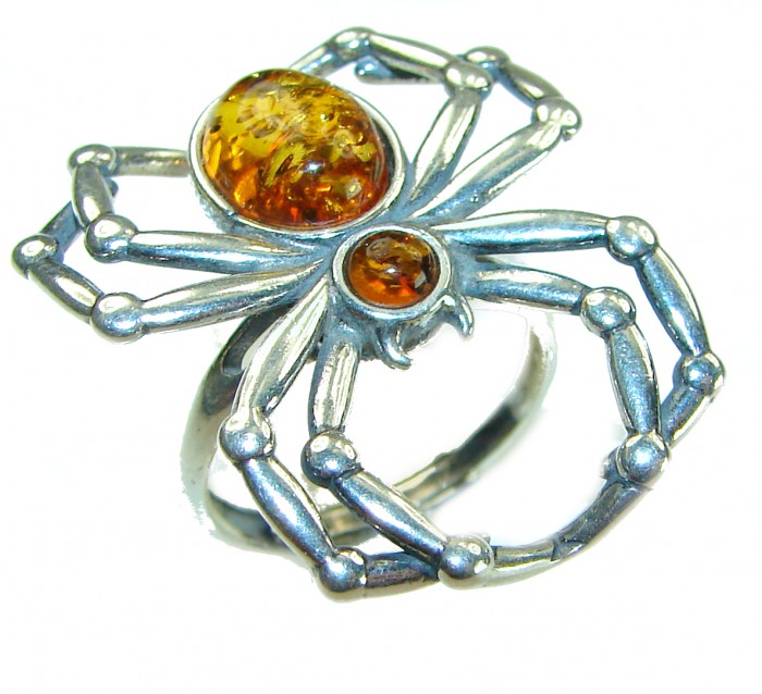 Golden Spider Authentic Baltic Amber .925 Sterling Silver handcrafted ring; s. 7 adjustable - Spider-shaped ring with amber stones, top view.