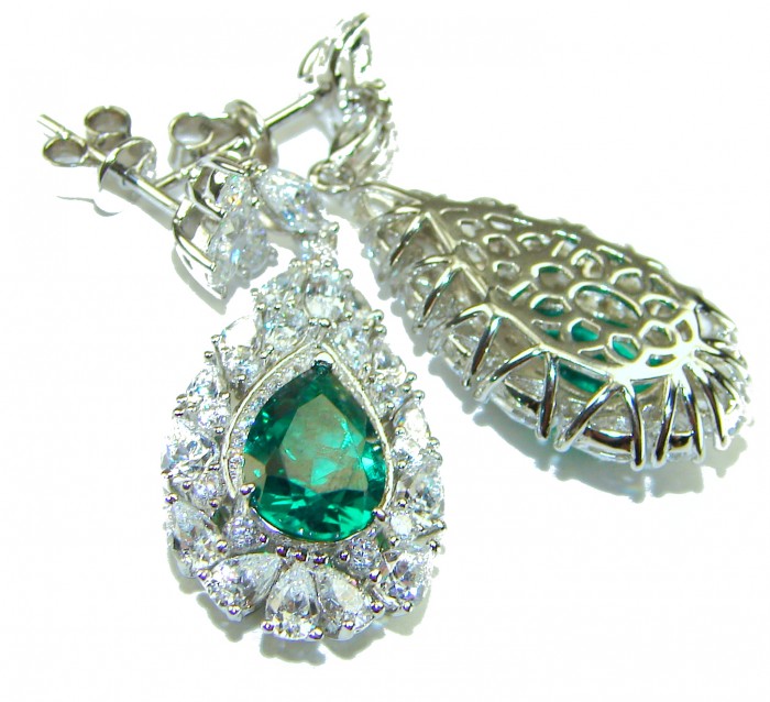 Giovanna - Authentic 8.9 carat Emerlad .925 Sterling Silver handcrafted earrings - Close-up of emerald and silver earrings, front and back views shown.