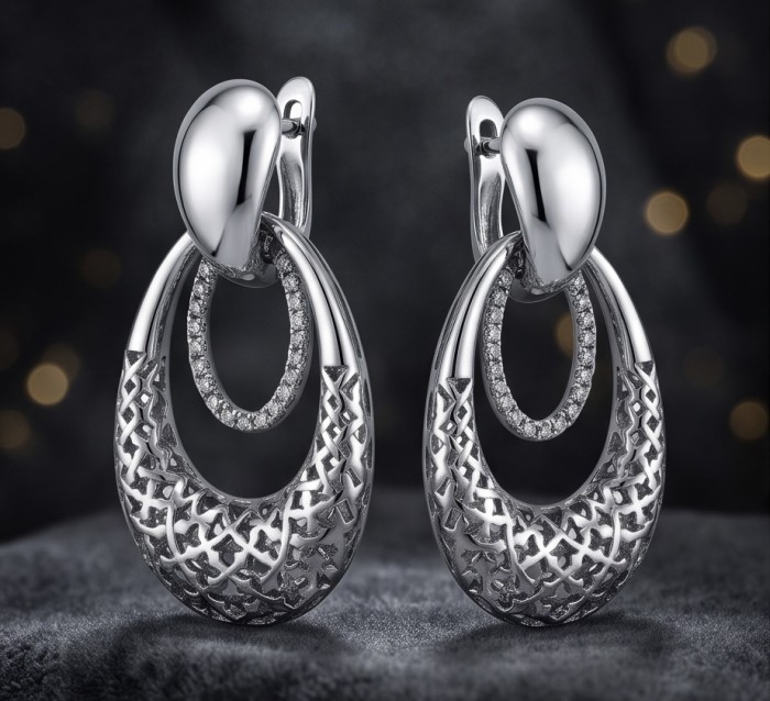 Highly Polished Fancy design 3.2 carat White Topaz .925 Sterling Silver Italy made Earrings - Front view of silver earrings with white topaz and intricate design.