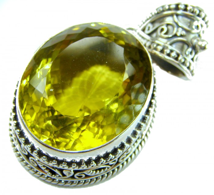Perfection Oval cut 45.3 carat Lemon Quartz .925 Sterling Silver handcrafted LARGE pendant - Close-up of oval cut 45.3 carat lemon quartz in ornate sterling silver.