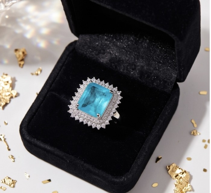Elizabeth 12.8 carat Colombian Emerald 2.7 carat Moissanite .925 Sterling Silver dipped in Rhodium handcrafted Ring size 7 1/4 - Top view of Elizabeth ring with emerald and moissanite in a box