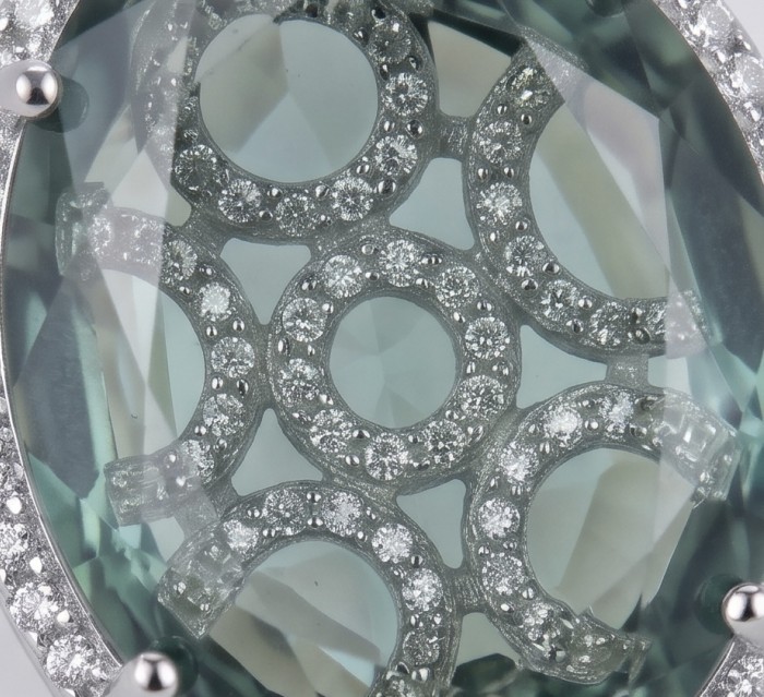 Mystery 22.5 carat Grandidierite .925 Sterling Silver Handcrafted Earrings - Close-up of Grandidierite stone with silver detailing.