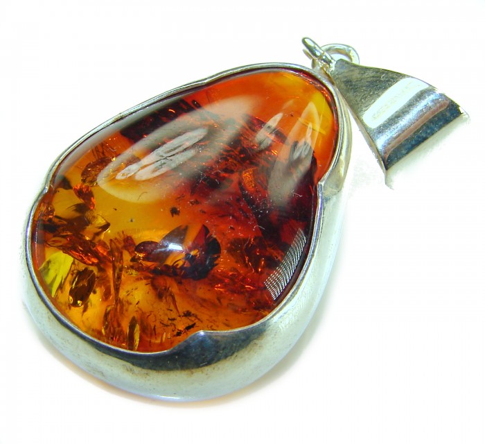 Prehistoric Authentic Baltic Amber .925 Sterling Silver beautifully handcrafted Pendant - Close-up of Baltic amber pendant in sterling silver setting