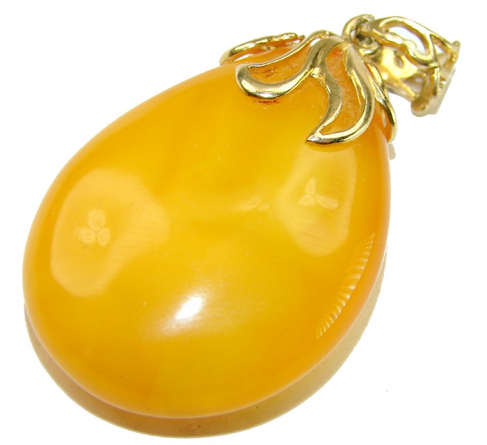 Sea Treasure Prehistoric Authentic Butterscotch Baltic Amber 18k Gold over .925 Sterling Silver beautifully handcrafted Pendant - Butterscotch Baltic amber pendant close-up with gold leaf detail.