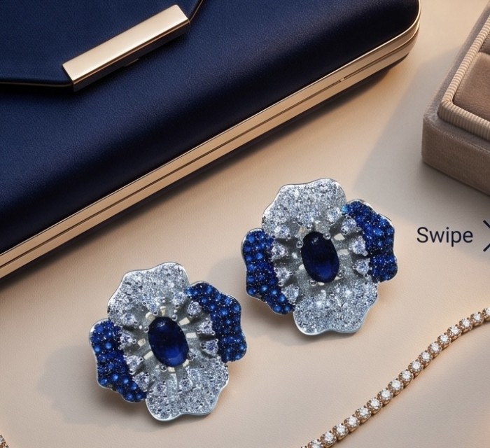 Natural 4.2 carat Mozambique Sapphire .925 Sterling Silver dipped in rhodium Handcrafted Earrings - Sapphire and sterling silver earrings, top view with accessories.