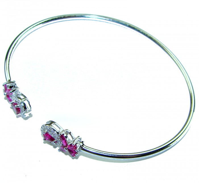 Giovanna 7.2 carat Mozambique Ruby .925 Sterling Silver .925 Sterling Silver dipped in rhodium Statement Bracelet - Sterling silver bracelet with ruby details, side view.