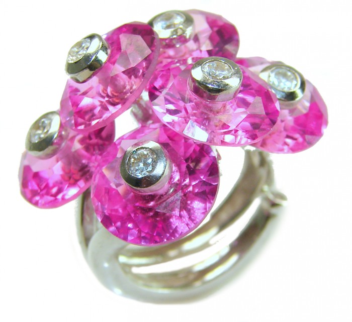 Six Flowers 25.8 carat Pink Sapphire .925 Silver handcrafted Cocktail Ring s. 8 adjustable - Close-up of pink sapphire flower ring on silver band.