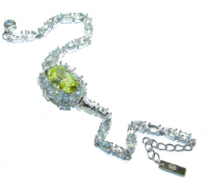 Luxurious 22.5 carat oval cut Authentic Yellow Sapphire .925 Sterling Silver handcrafted Statement Bracelet - Bracelet featuring 22.5 carat oval yellow sapphire, overhead view.